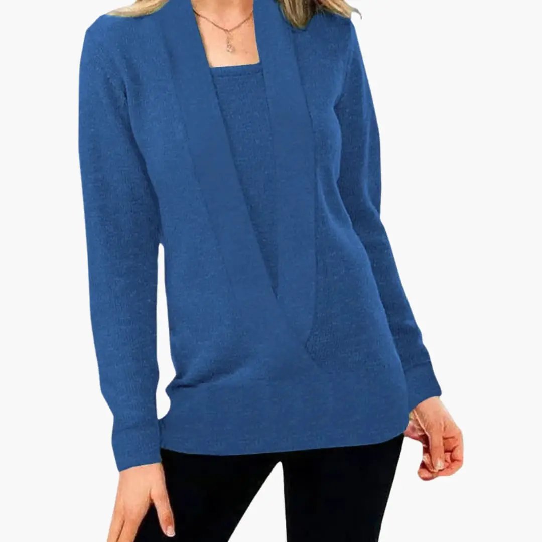 Women's blue knit sweater with deep V-neck and long sleeves by Wilfred Smith