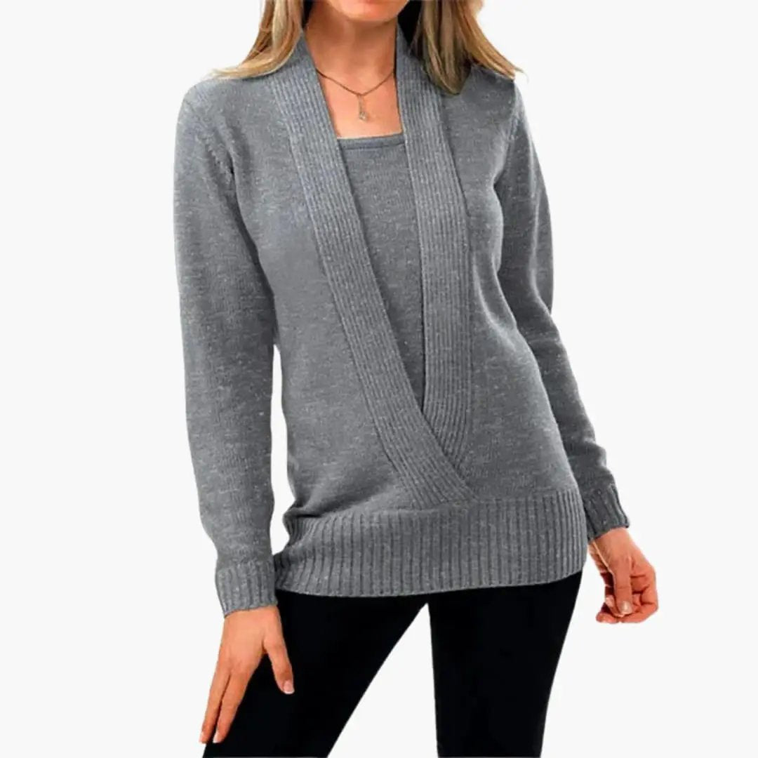 Women's gray knit sweater with deep V-neck wrap front and long sleeves
