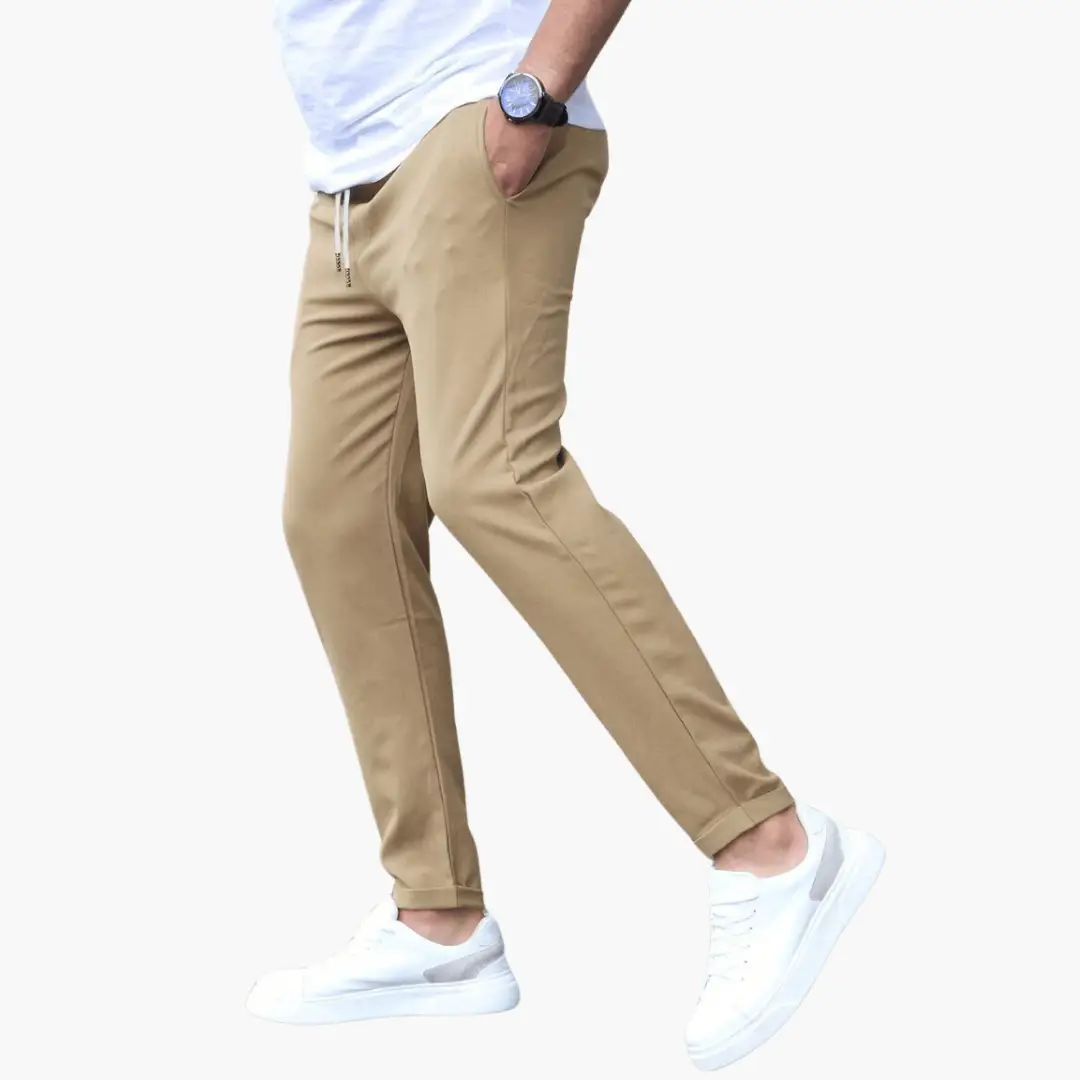 Men's stretch trousers with slim legs in tan, white drawstring waistband.
