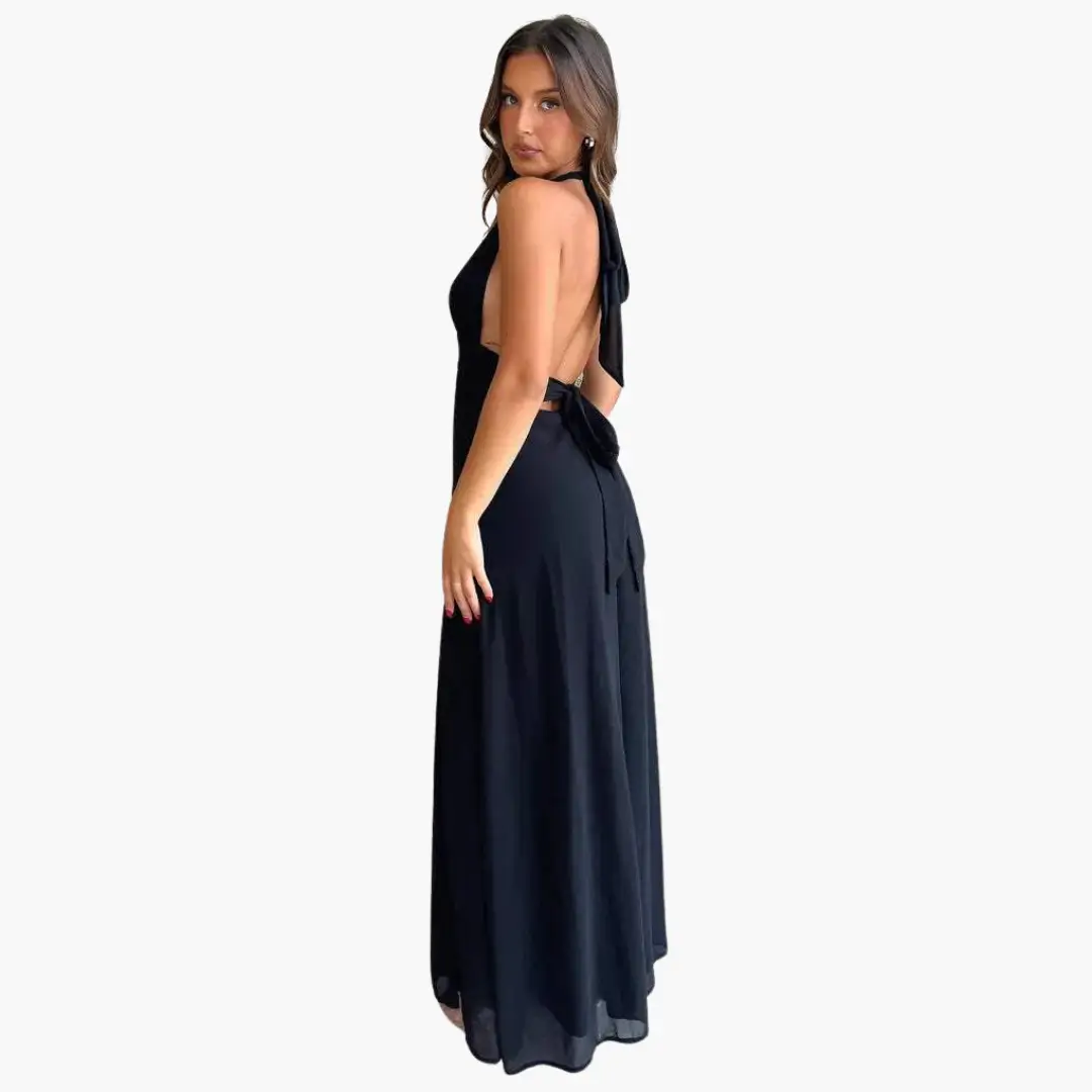 Maxi Dress with Halter Neck by Wilfred Smith in black, backless with a bow and side slit