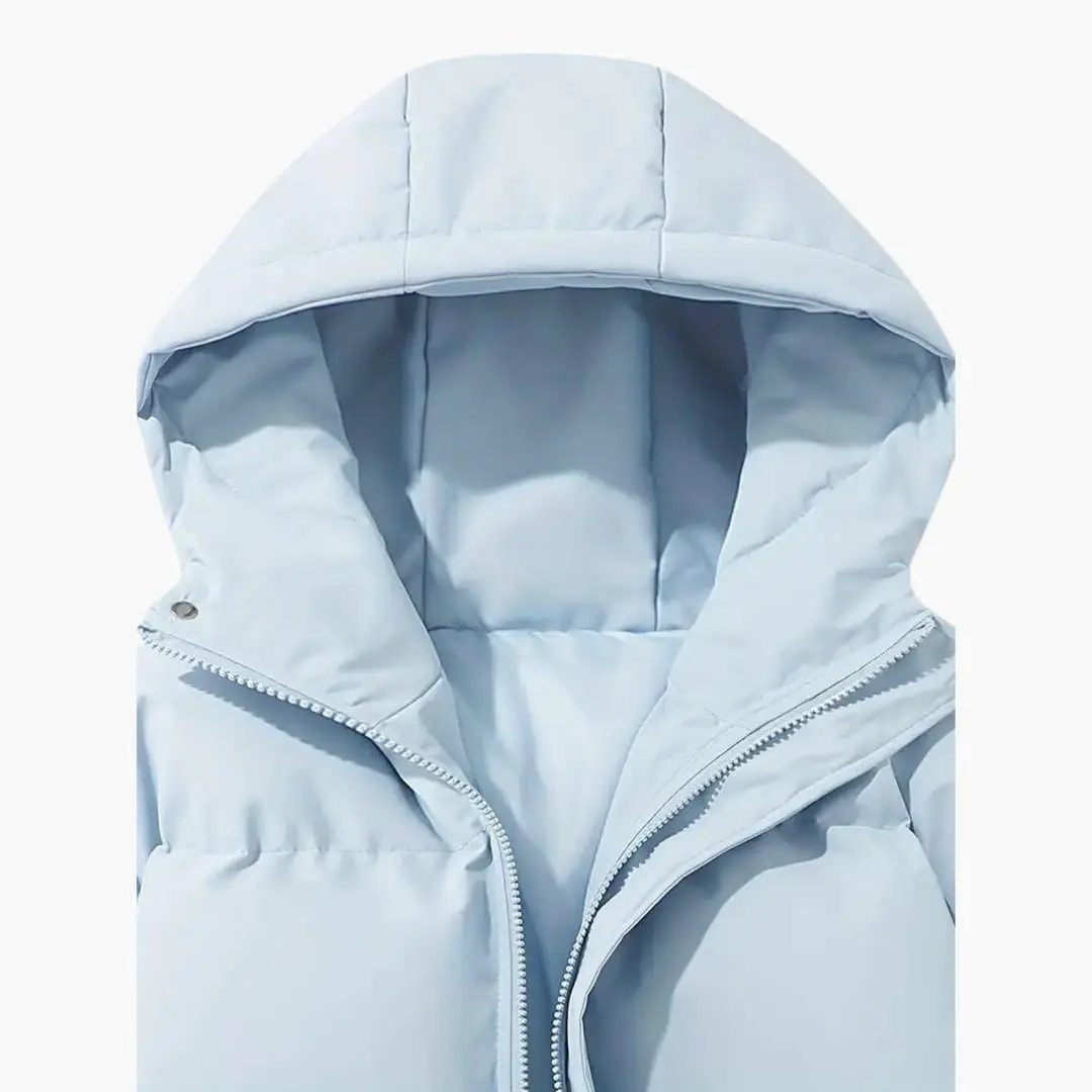 Women's hooded jacket parka in light blue with front zipper and exterior stitching by Wilfred Smith