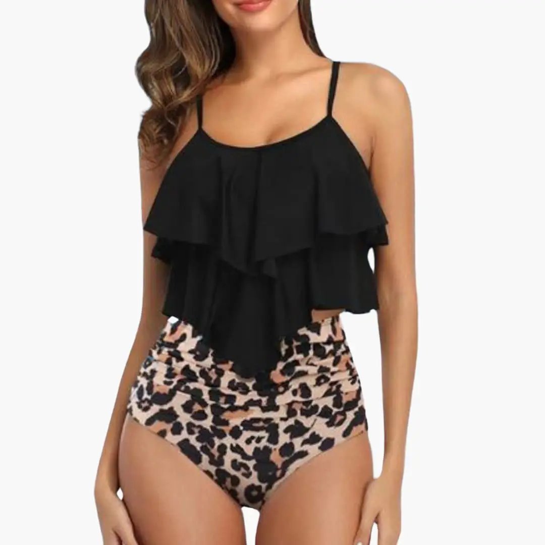 Two-piece women's tankini by Wilfred Smith with black ruffled top and leopard-print bottoms.