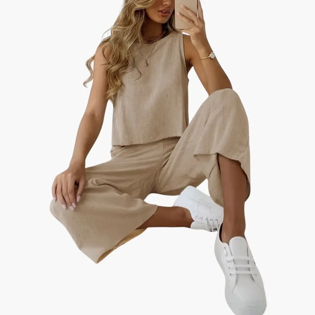 Beige two-piece women's outfit set with sleeveless top and wide-leg pants