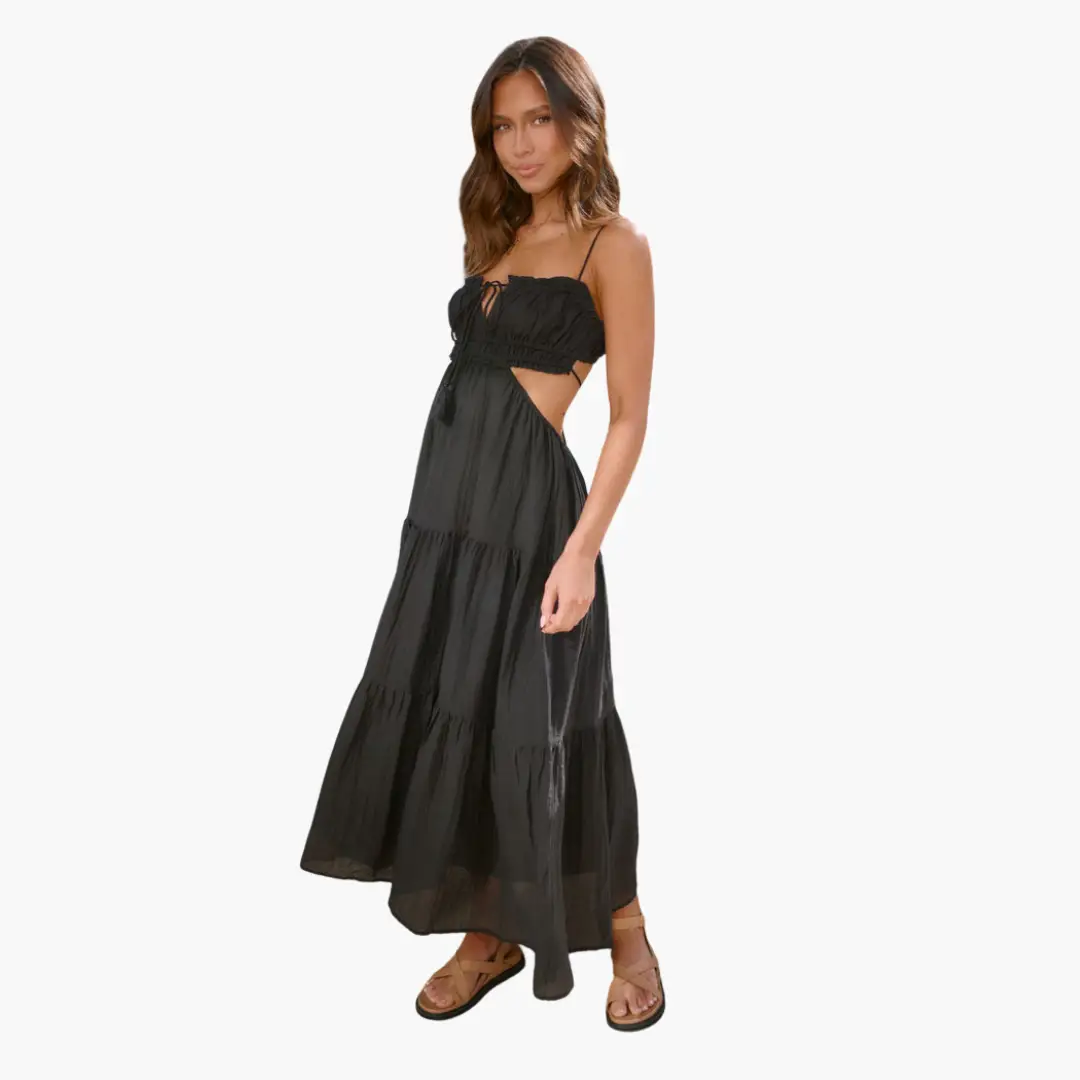 Maxi dress in black, boho style with tie-front bodice and side cutout; tiered skirt