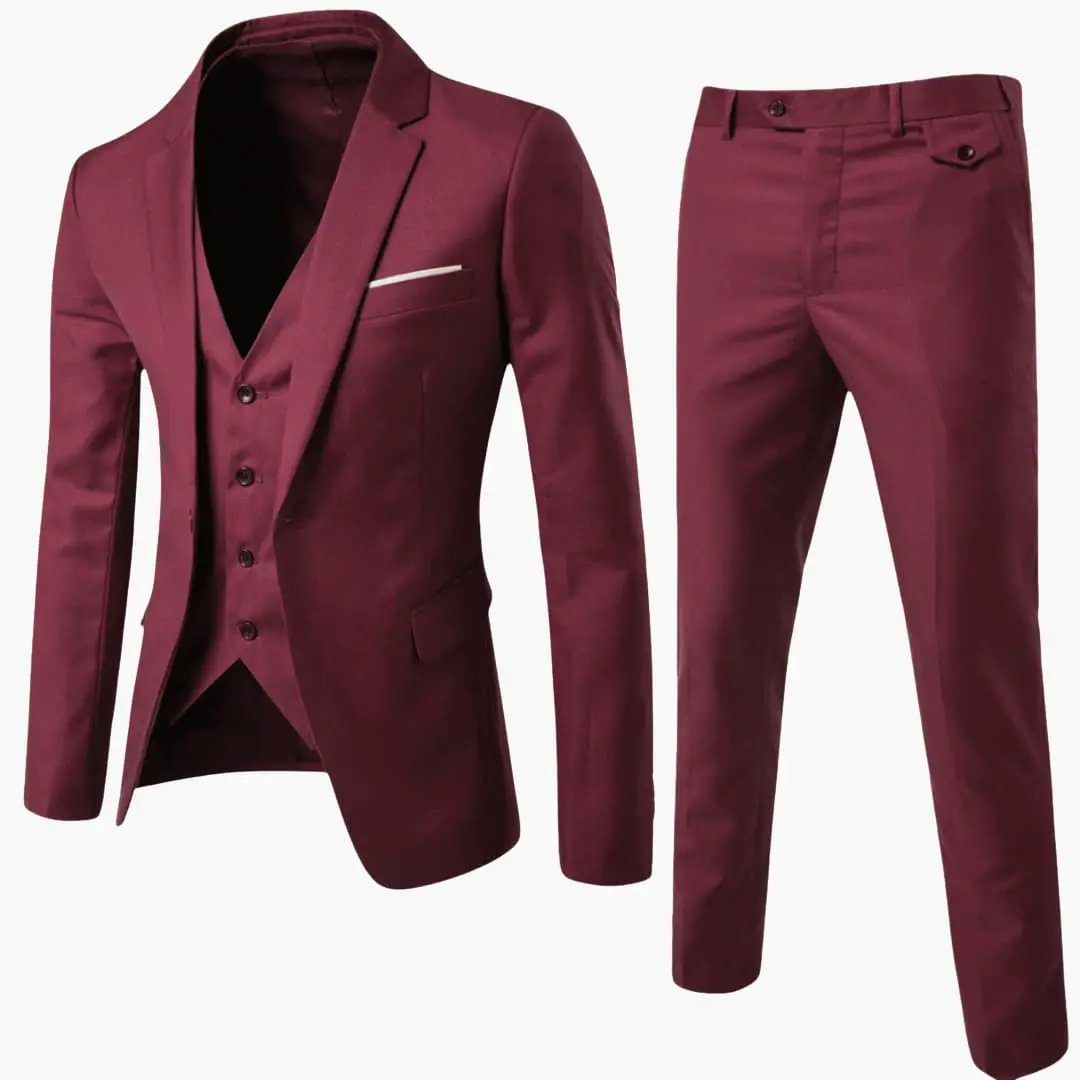 Men's three-piece wedding suit by Wilfred Smith in burgundy with jacket, vest and trousers