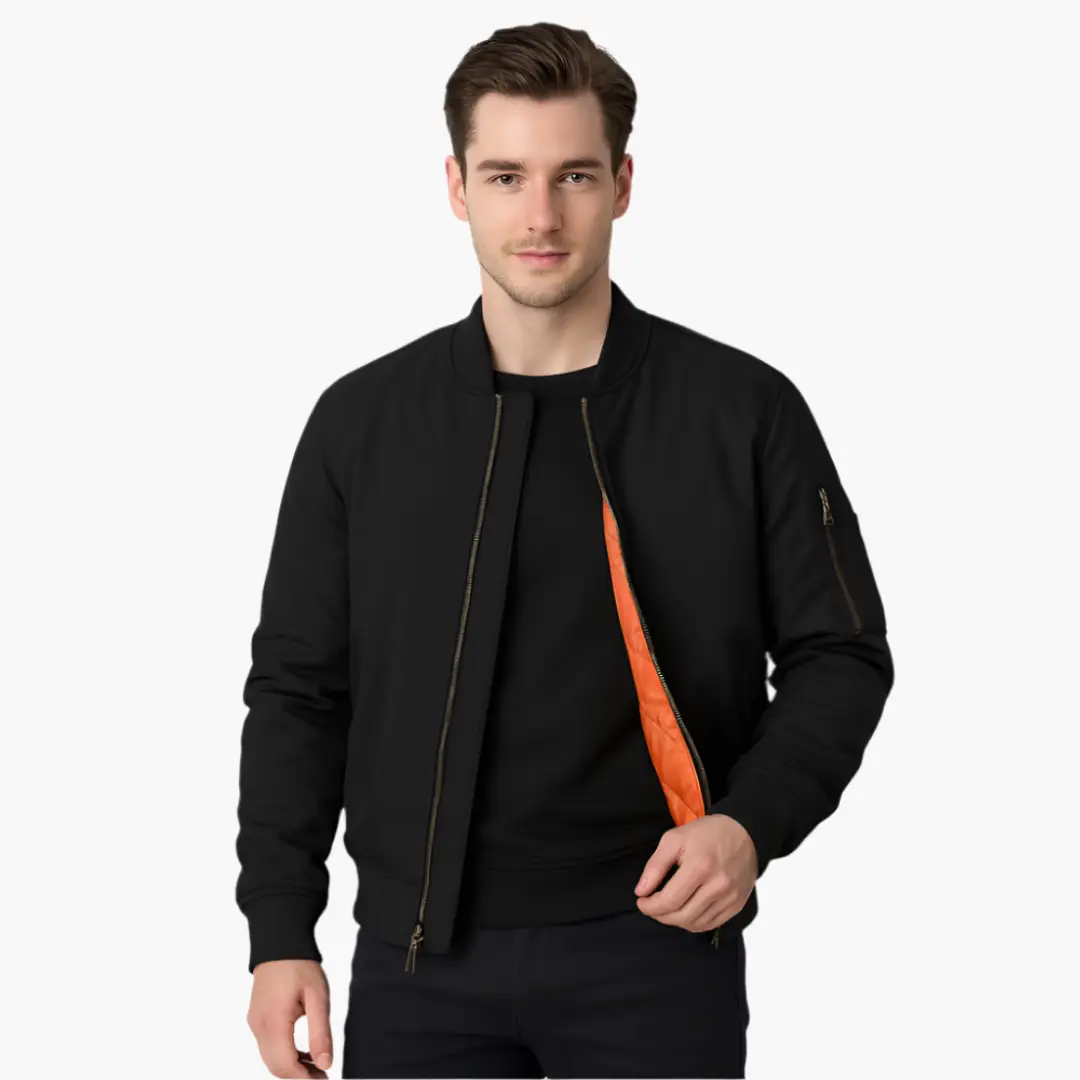 Men's black bomber jacket with orange quilted lining along the zip, ribbed cuffs.