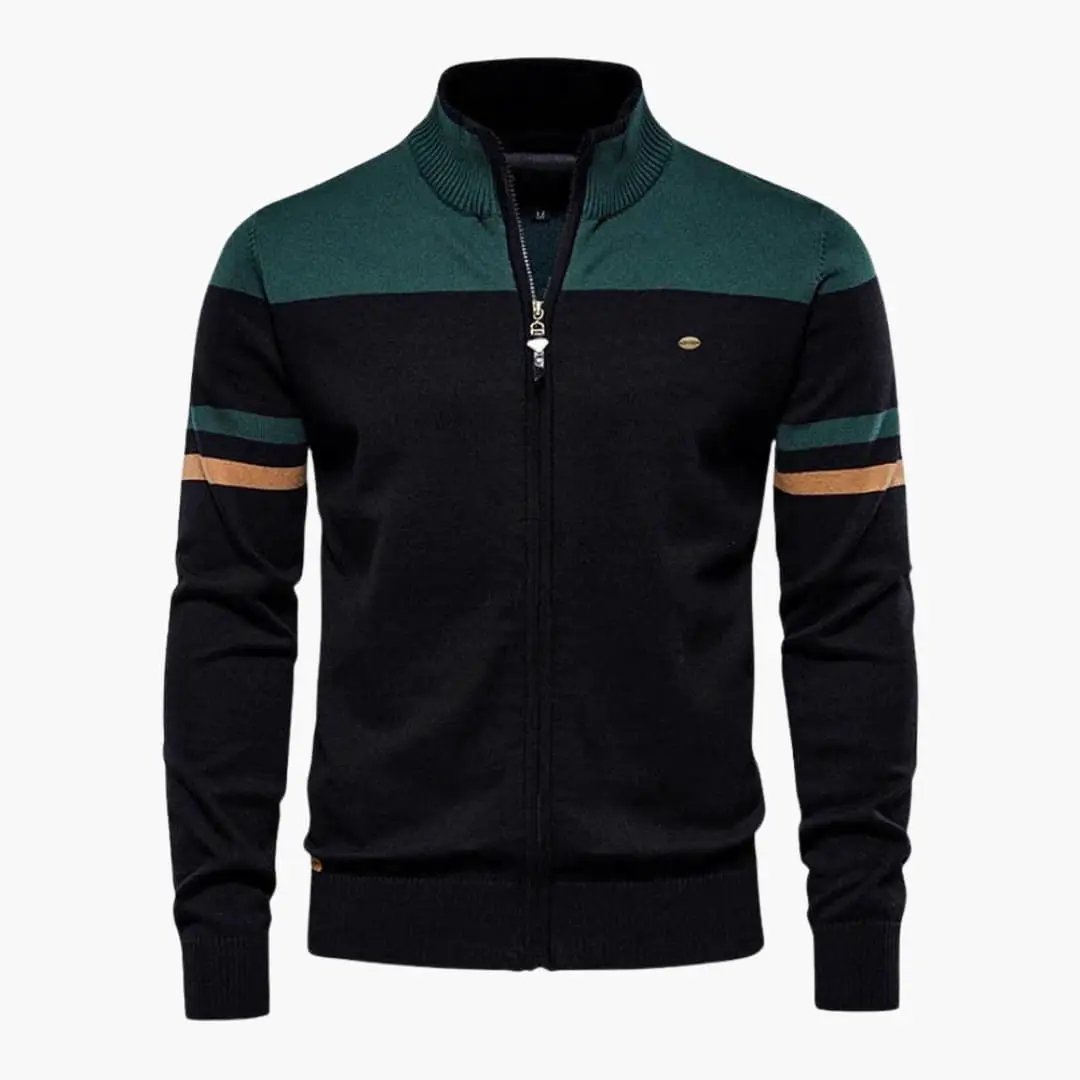 Men's zip-up cardigan by Wilfred Smith; black body with green yoke, striped sleeves, gold zipper pull, ribbed hem.
