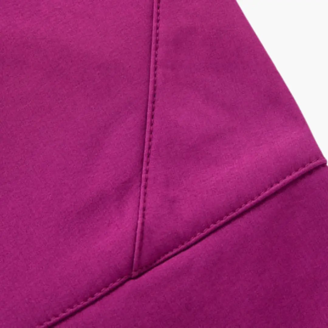 Women's hiking pants with zipper pockets in magenta fabric
