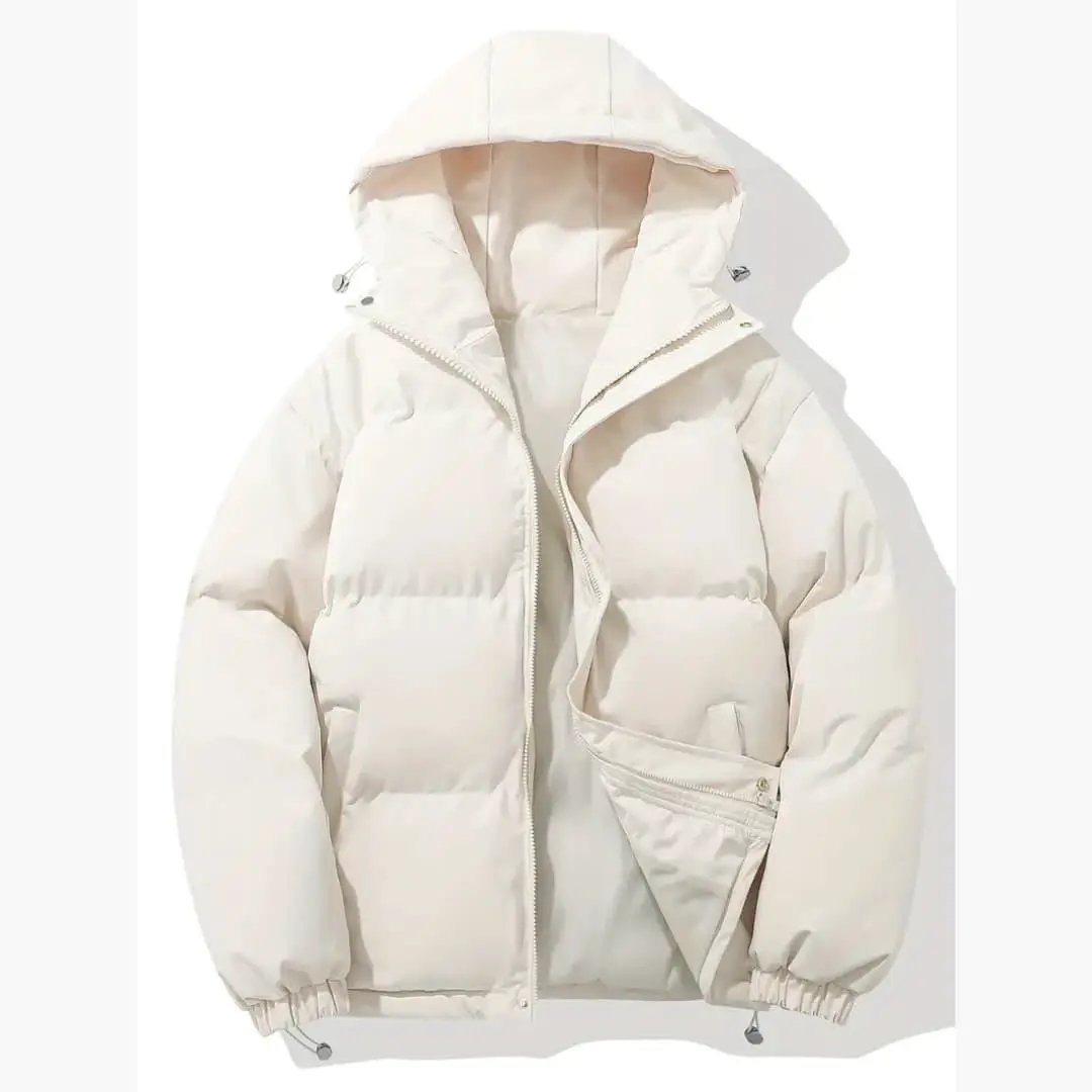 Women's hooded cream puffer jacket with zipper closure and exposed exterior stitching