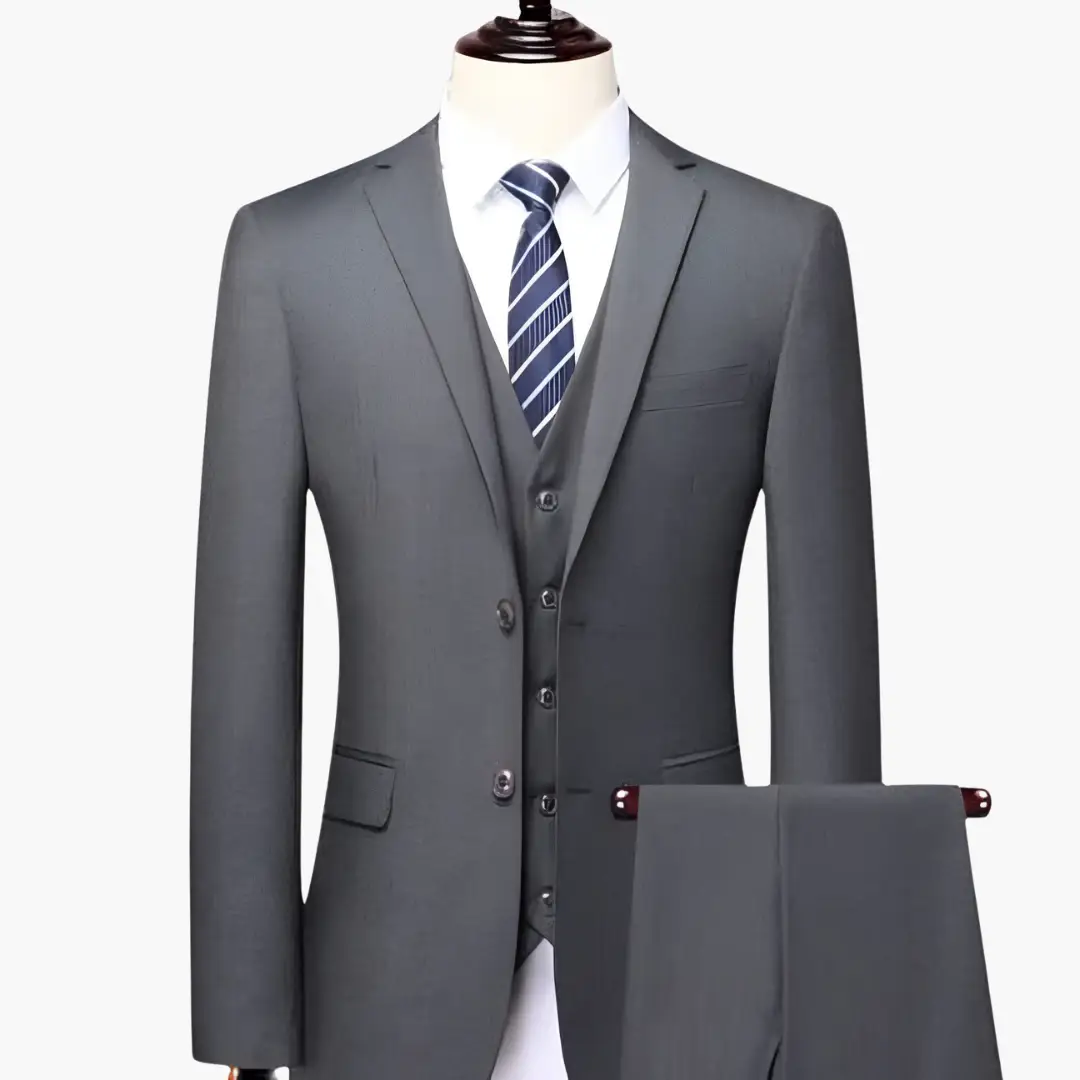 Three-piece men's suit set by Wilfred Smith: gray jacket, vest, and trousers.