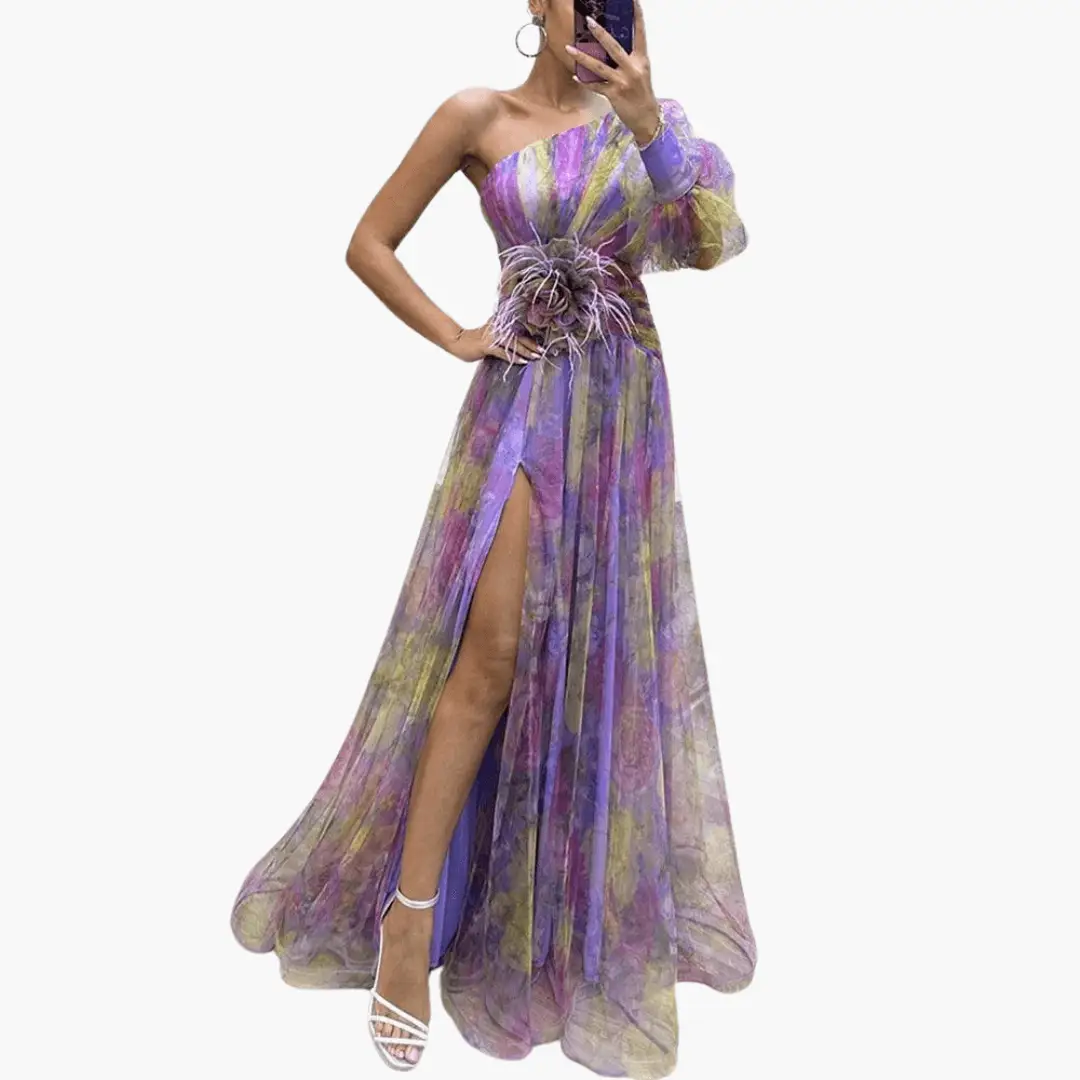 Elegant one-shoulder party dress by Wilfred Smith in purple-lilac multicolor tulle with thigh-high slit