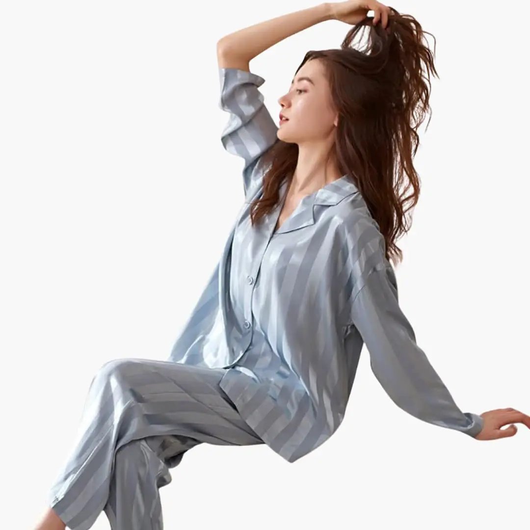 Women's satin pajama set with striped light-blue long-sleeve shirt and pants
