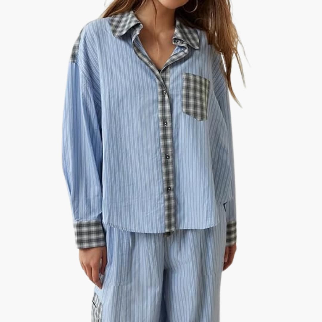 Women's striped blue pajama set with button-down top and elastic waist pants; plaid cuffs and chest pocket.