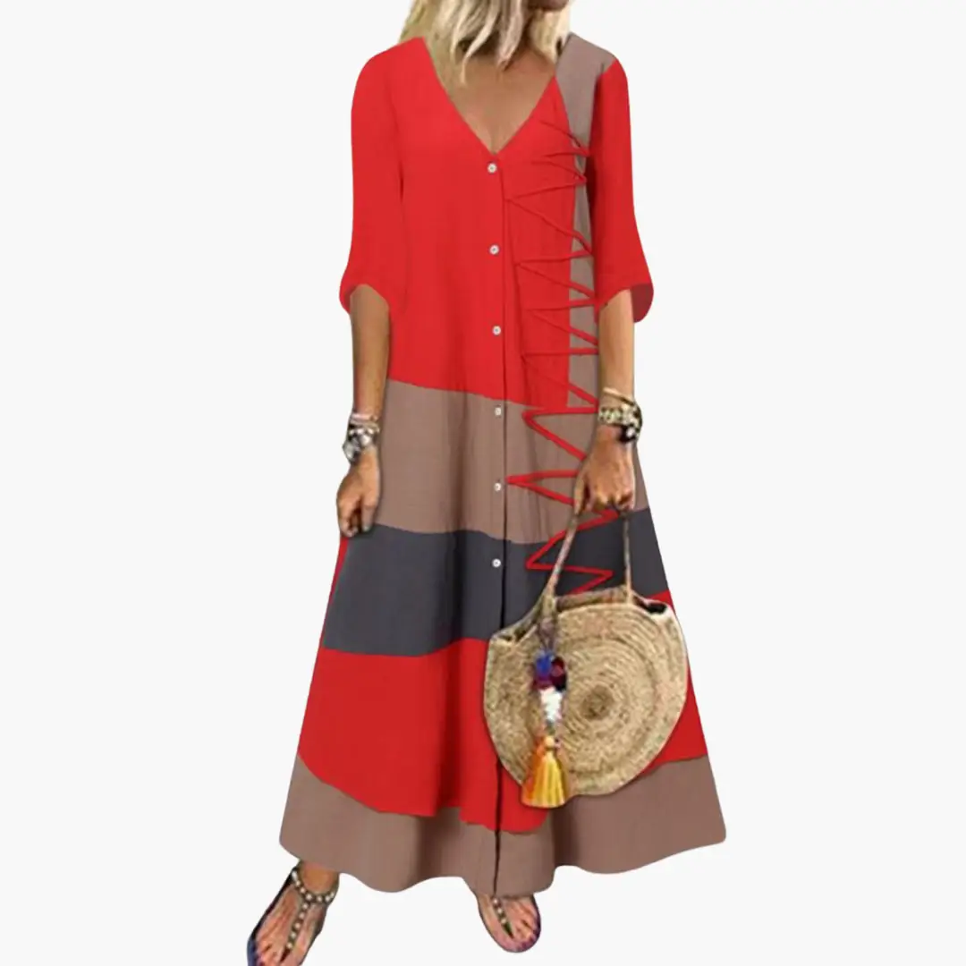 Long knit maxi dress for women with red bodice, color-block panels, V-neck, and side lace-up detail.