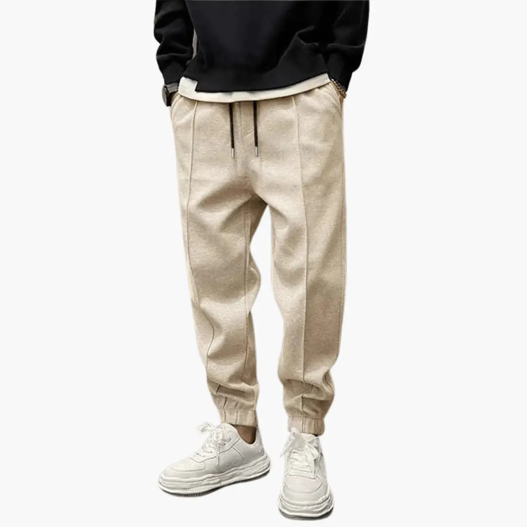 Men’s Cargo Trousers in beige with drawstring waist and relaxed legs, featuring multiple pockets