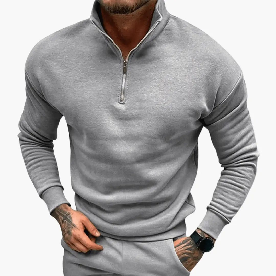 Men's zip-up sweatshirt in heather gray with a half-zip collar and long sleeves.