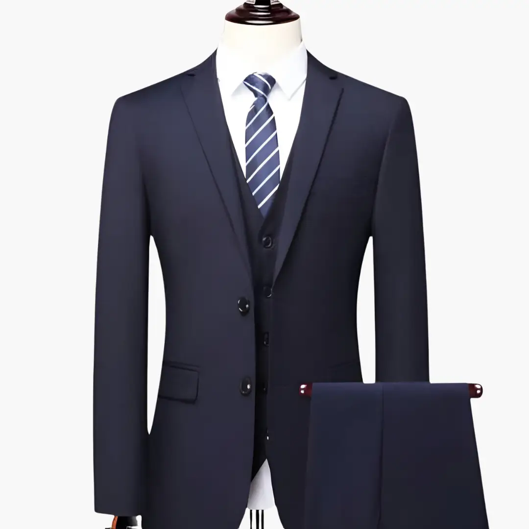 Three-piece men's navy suit set with jacket, vest and trousers, shown with white shirt and striped tie