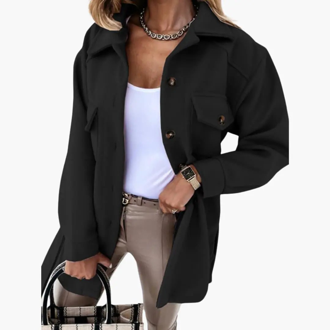 Women's jacket, long black with button-front and chest pockets.