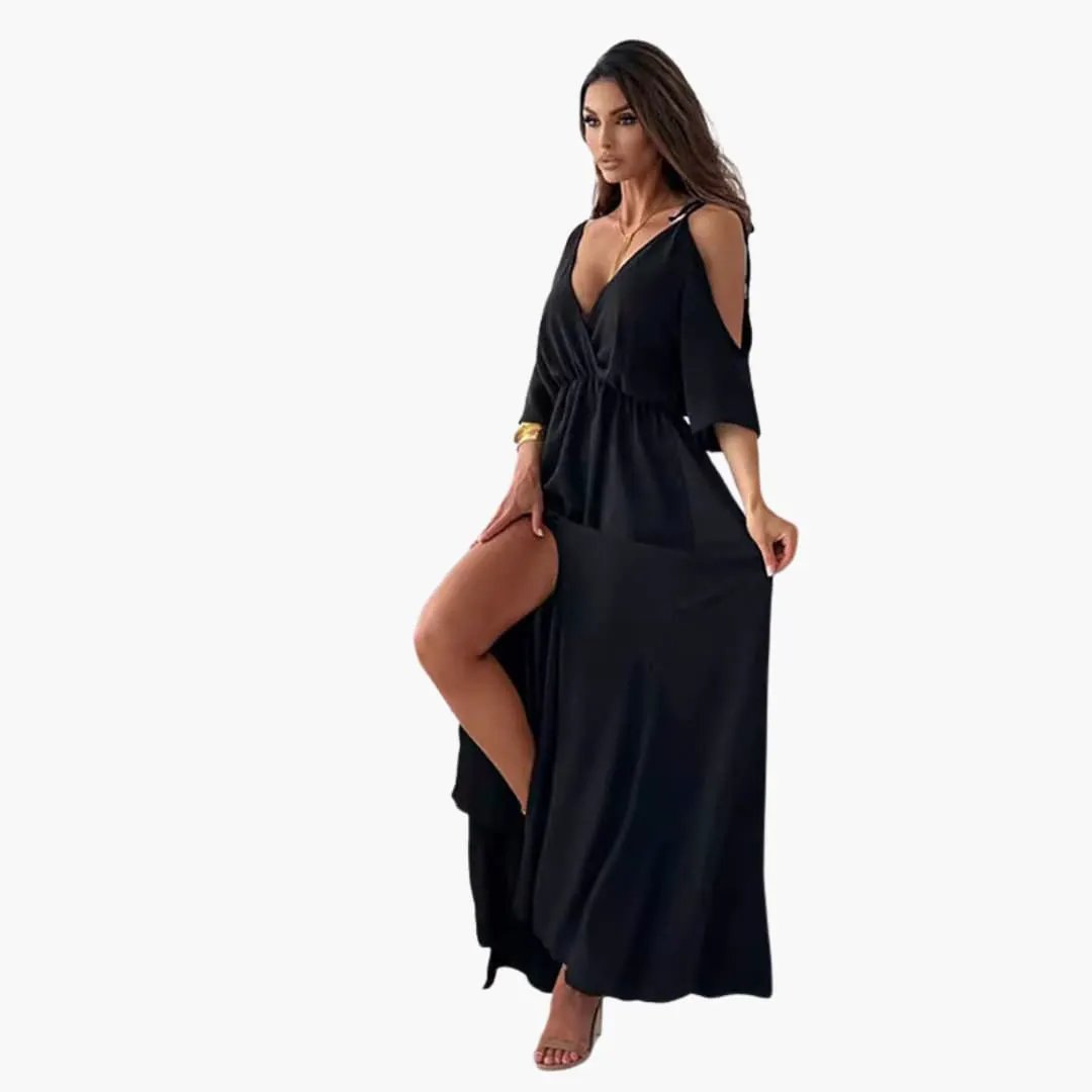 Maxi dress in black with V-neck and high slit, flowing evening-wear silhouette.