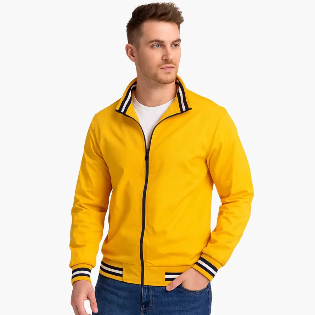 Men's bomber jacket in yellow with front zipper and striped cuffs and hem by Wilfred Smith