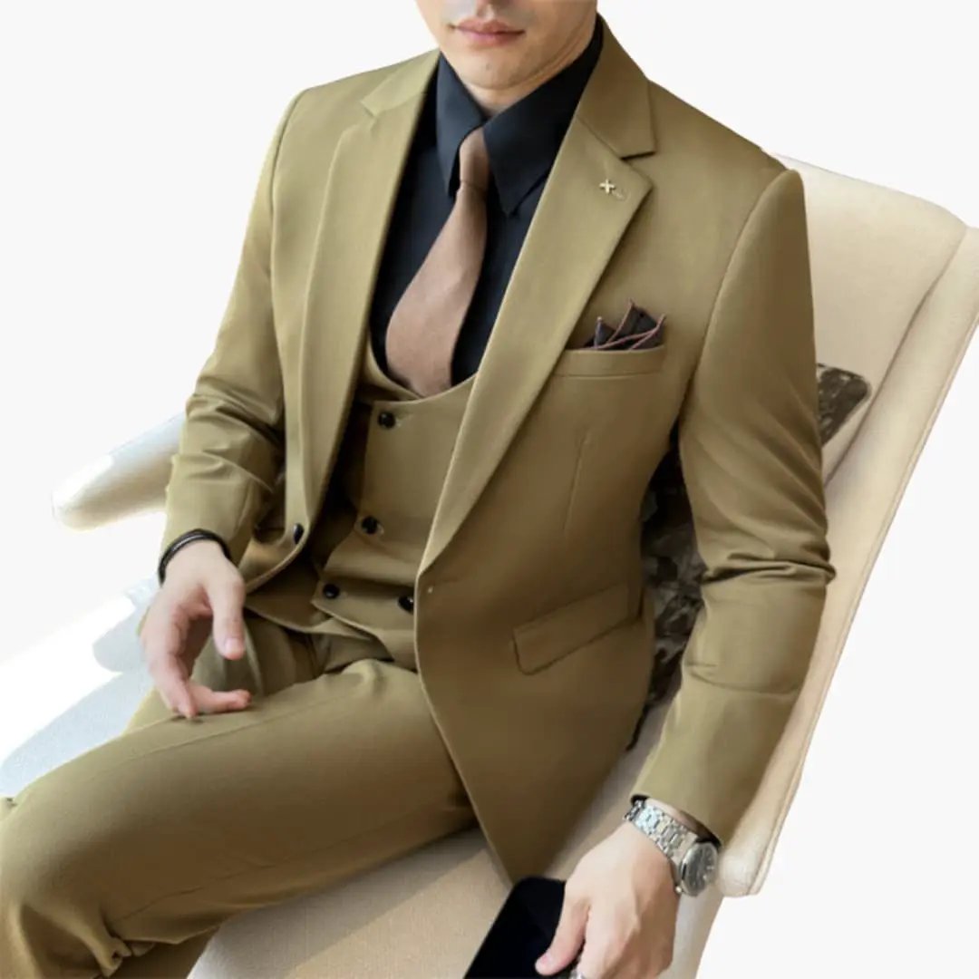 Three-piece men's tan suit set with notch lapel, waistcoat, and brown tie.