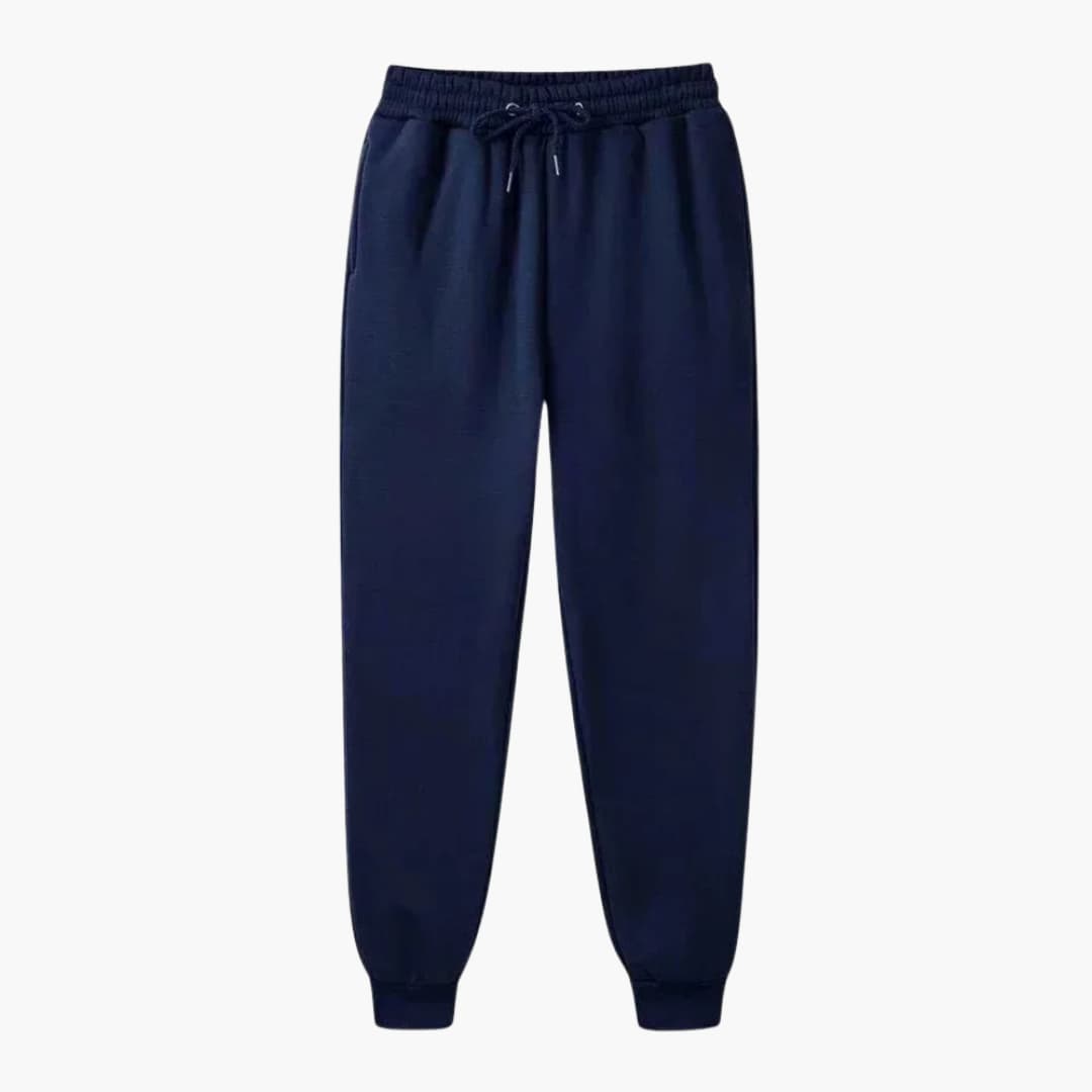Unisex jogging pants by Wilfred Smith in navy with drawstring waistband and cuffed hems.