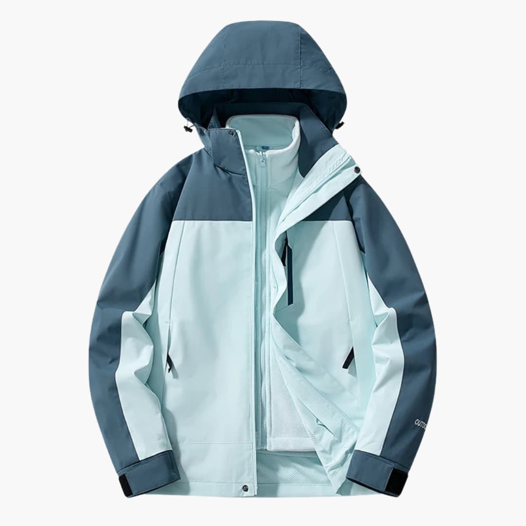 Unisex ski jacket Wilfred Smith with hood, color-block navy and light teal, zip pockets.