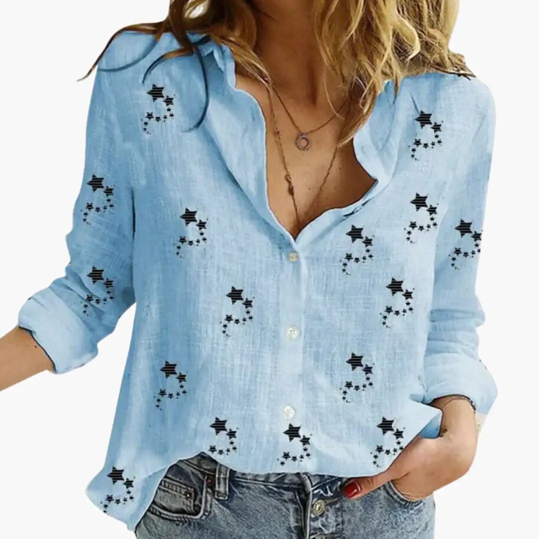 Blouse, light blue with black floral print, long sleeves, button-down front.