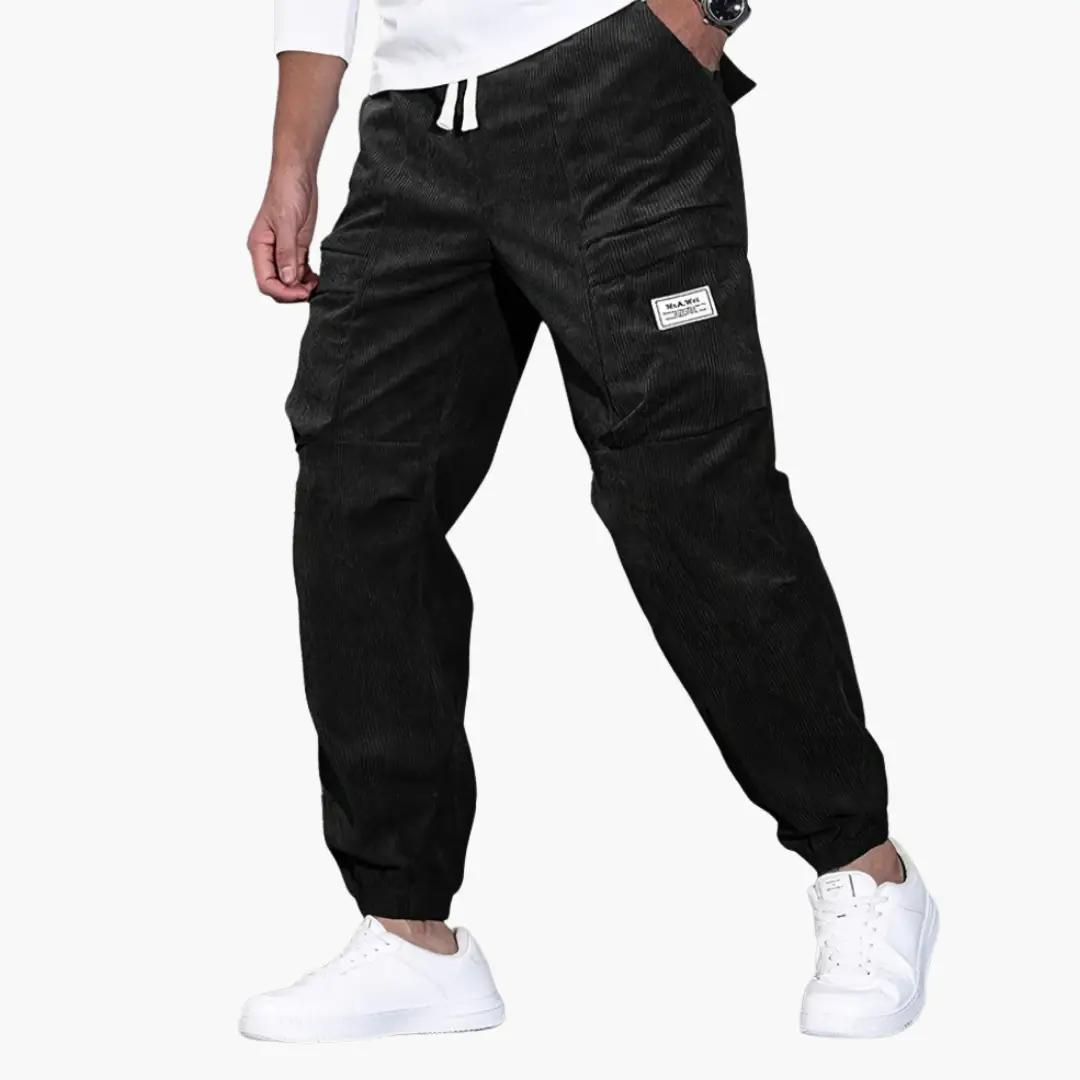 Men's black corduroy trousers with waistband and side pockets by Wilfred Smith