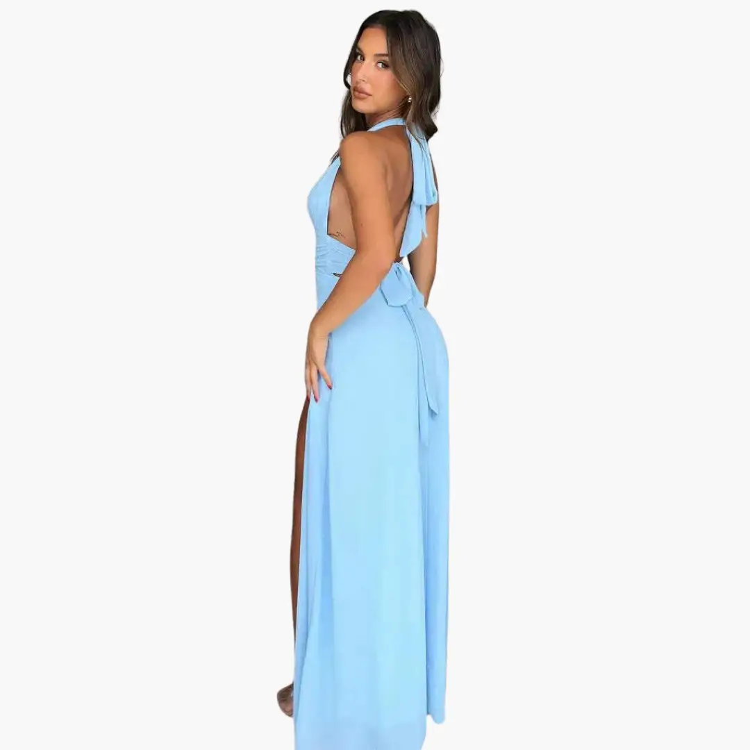 Maxi dress by Wilfred Smith in light blue halter-neck with side slit