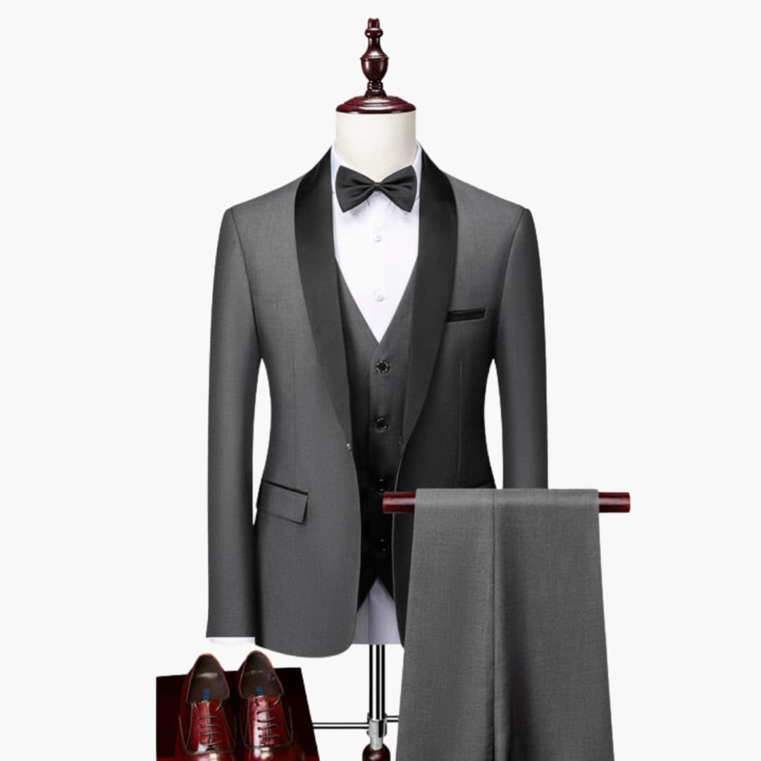 Men's three-piece suit with red accents and shawl collar by Wilfred Smith