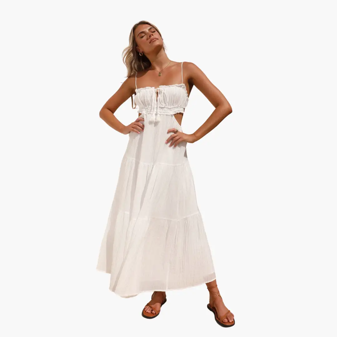 Maxi dress for women in white boho style with tie straps and flowing skirt.