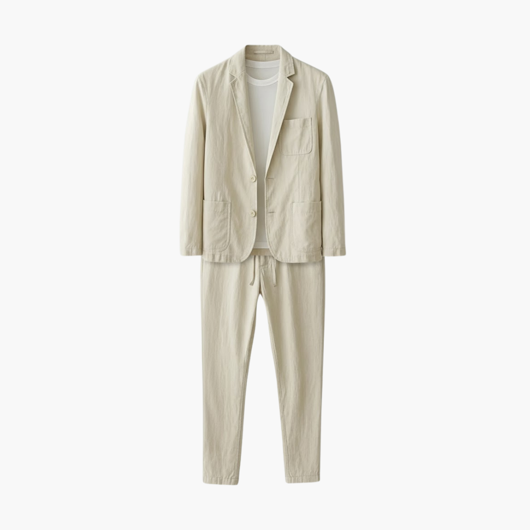 Men’s two-piece beige pant suit by Wilfred Smith with patch-pocket blazer and drawstring trousers.