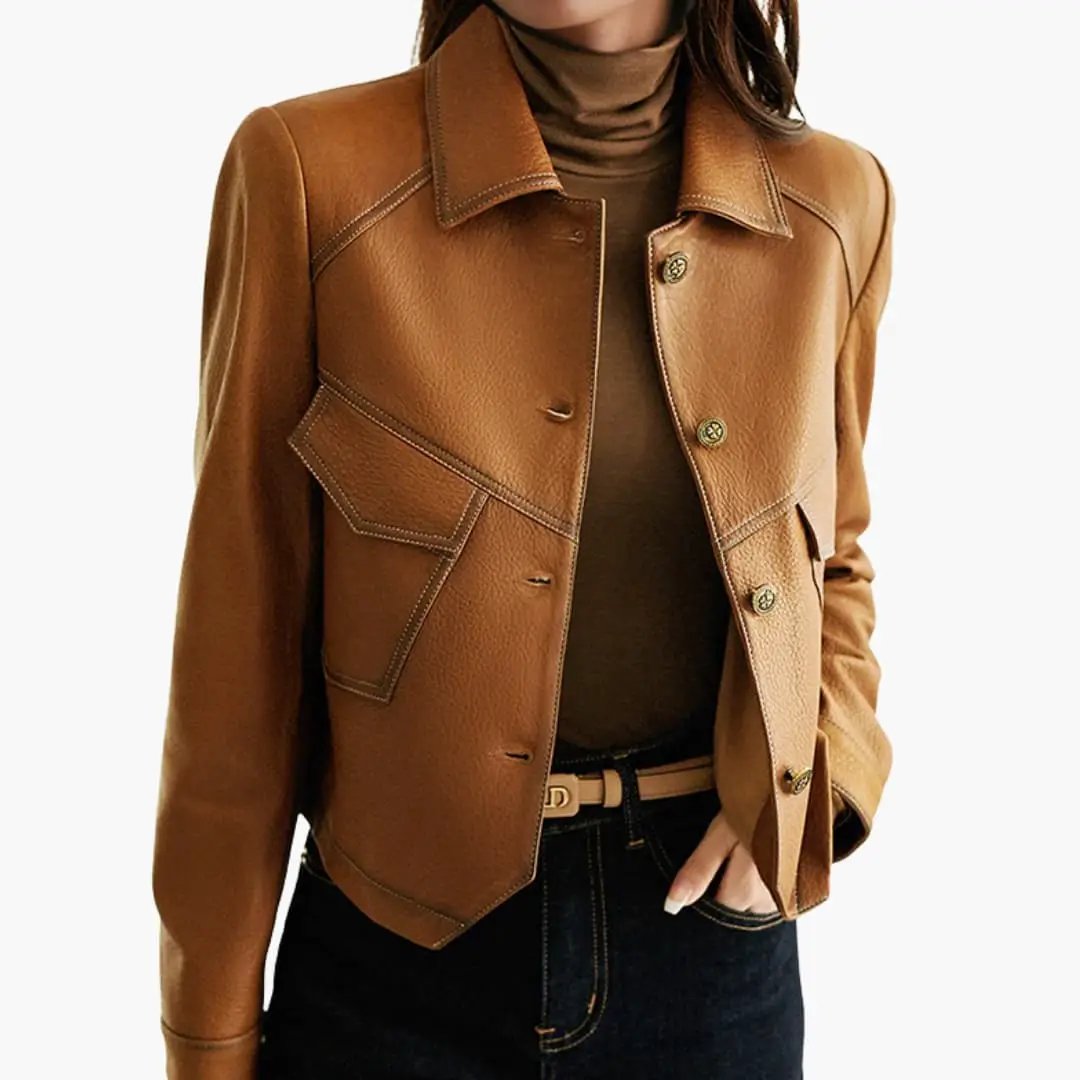 Women's brown leather jacket with long sleeves, large patch pocket and visible stitching