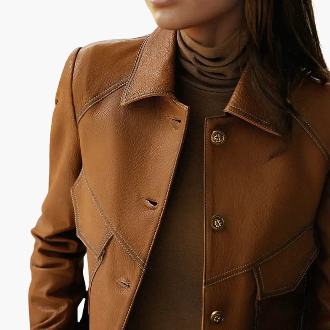 Women's brown leather jacket with long sleeves by Wilfred Smith