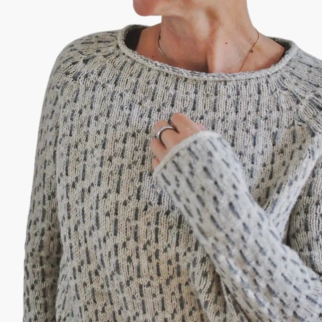 Women's grey knit sweater with round neck and speckled texture