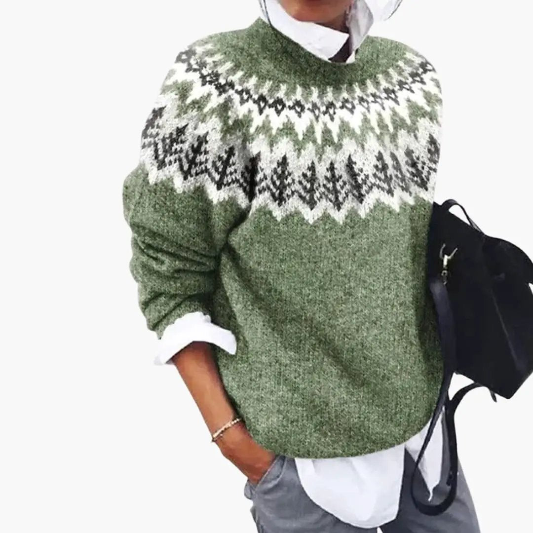 Women's green ribbed knit pullover with round neck and Nordic yoke pattern.