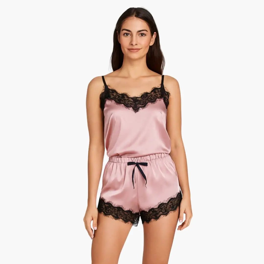 Women's satin pajama set with V-neck top and lace-trim shorts; pink with black lace, Wilfred Smith.
