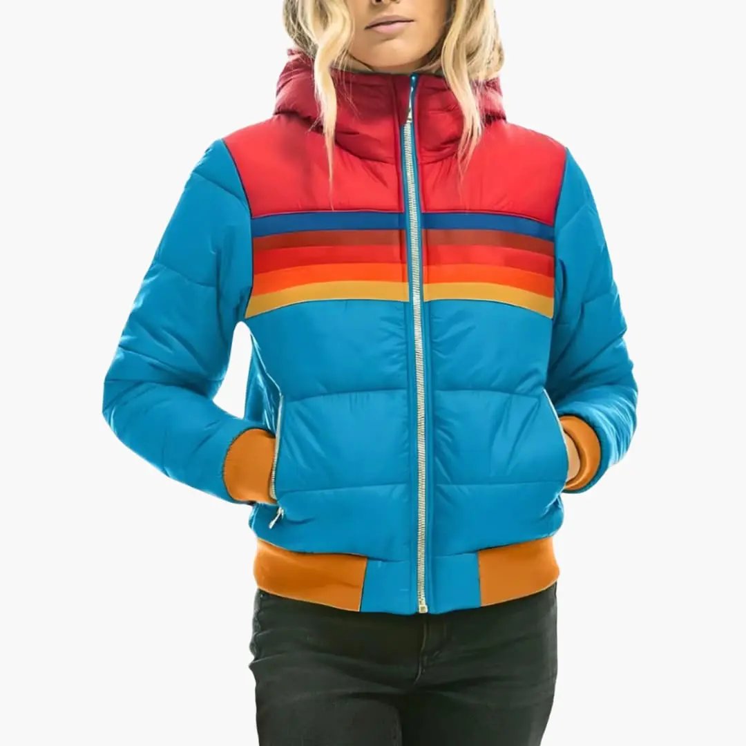 Women's padded puffer jacket with hood in blue, featuring red yoke and rainbow chest stripes with orange cuffs.