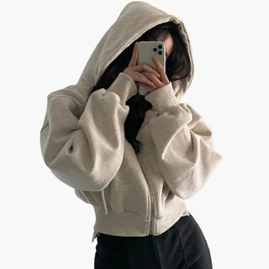 Women's cropped beige zip hoodie with oversized sleeves by Wilfred Smith.