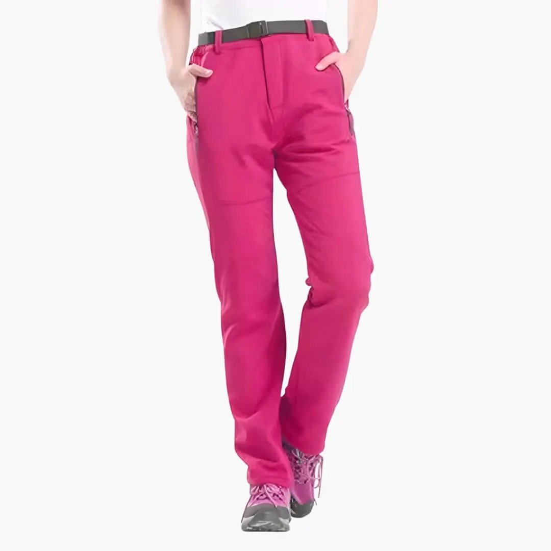 Women's hiking pants with straight leg in bright pink, belted waist and side pockets.