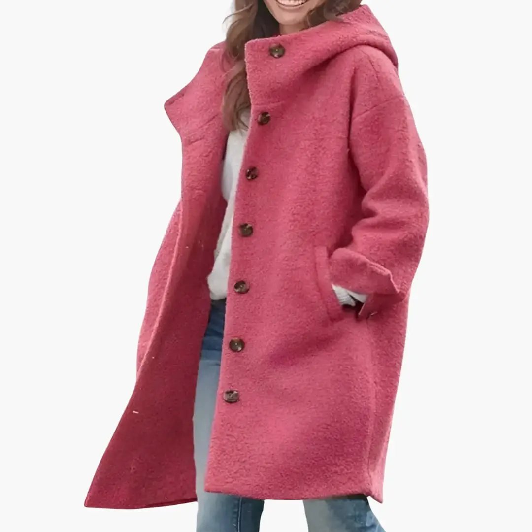 Women's long pink teddy coat with button-front closure and pockets
