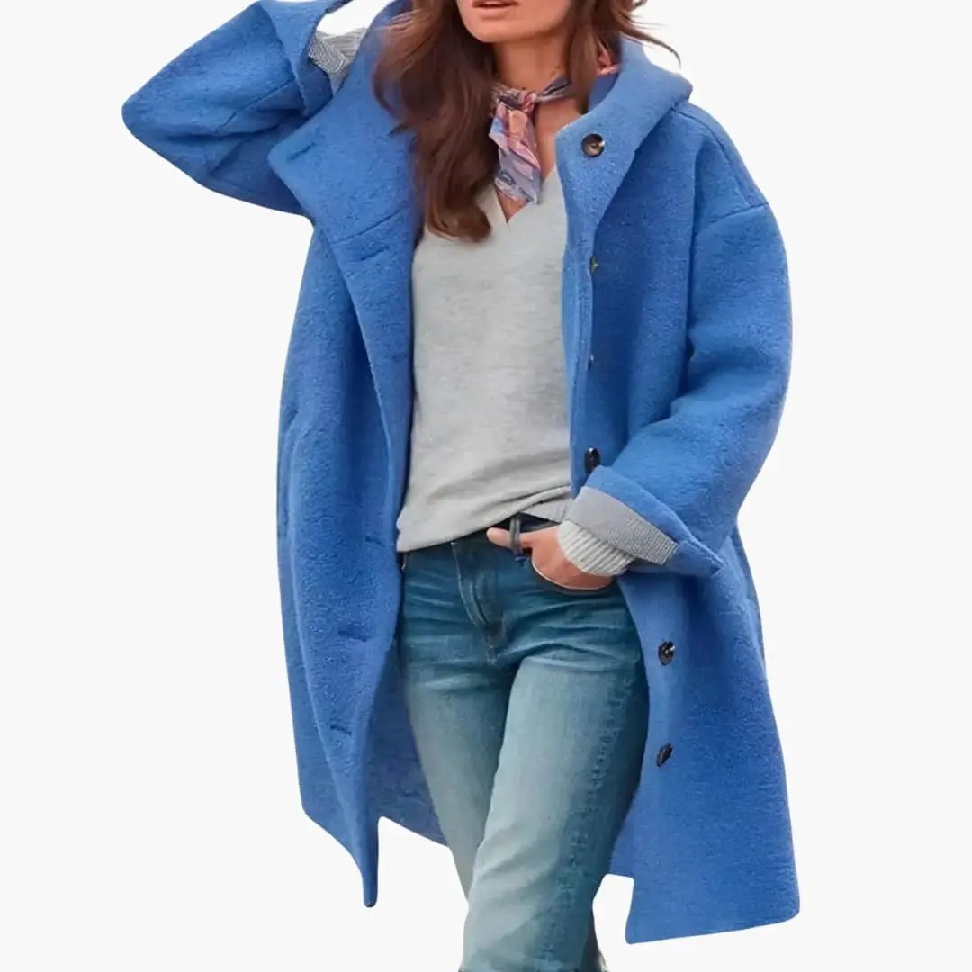Women's long winter coat by Wilfred Smith in blue with buttons and pockets.