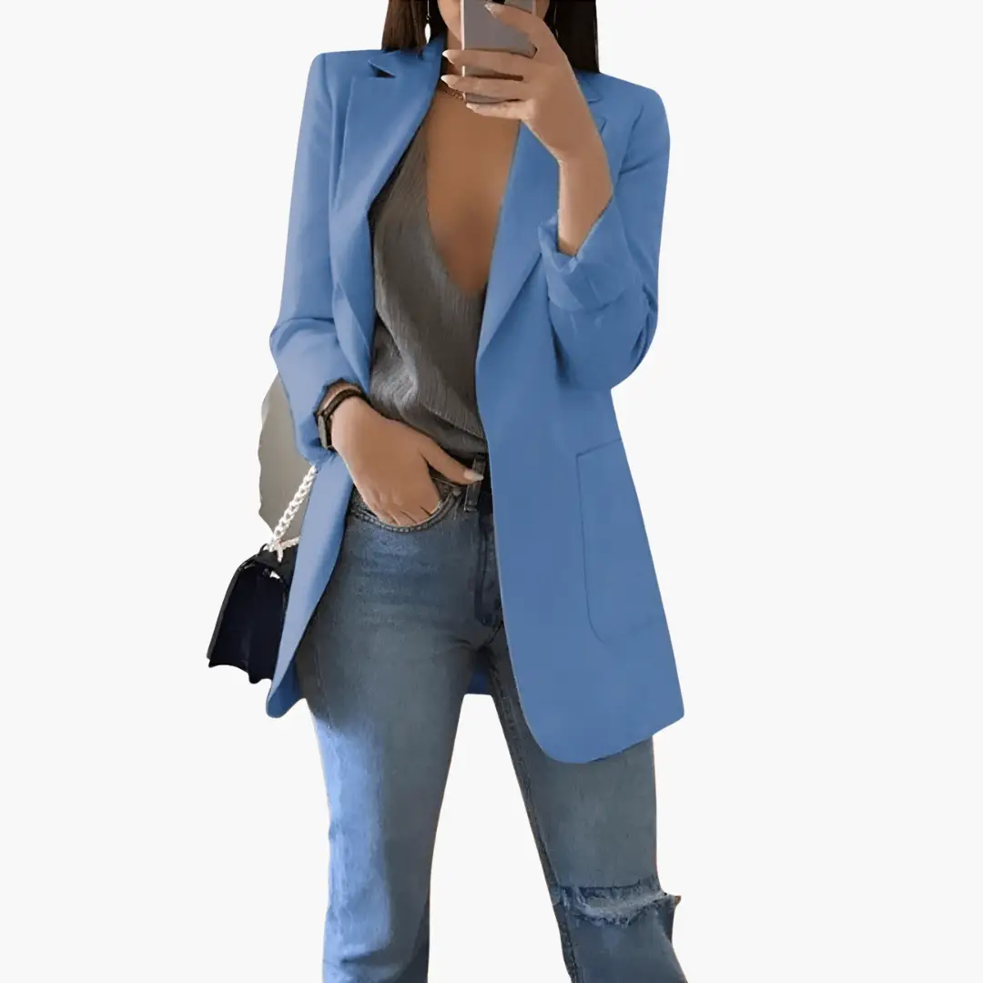 Women’s blazer in light blue, open-front with long sleeves by Wilfred Smith.