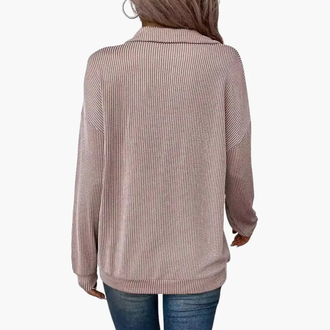 Women's striped pullover by Wilfred Smith; mauve and white vertical stripes, back view.