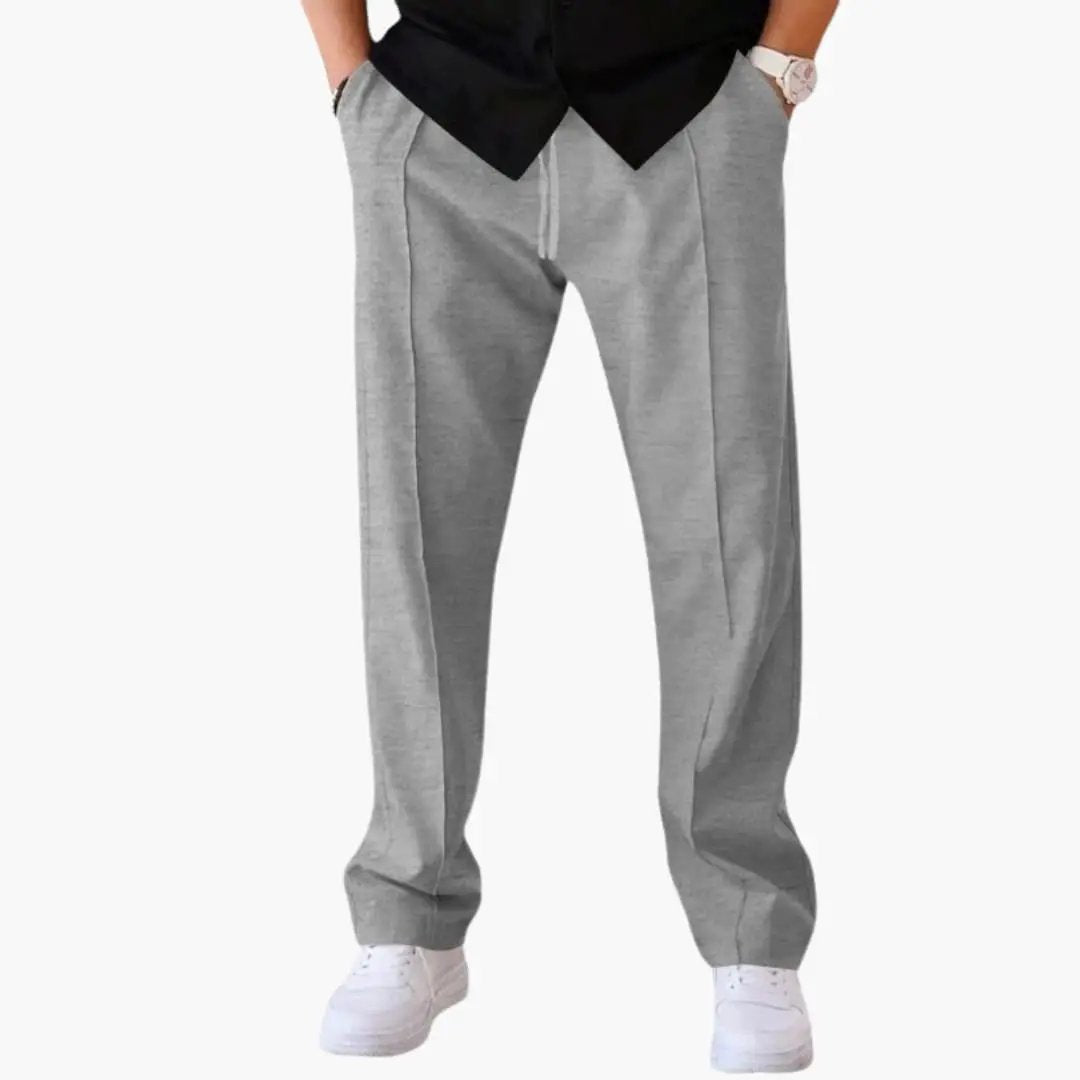 Men's grey straight-leg trousers with side pockets and drawstring waist by Wilfred Smith