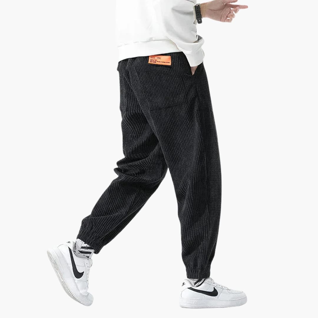 Men's corduroy joggers by Wilfred Smith with drawstring and cuffs, black