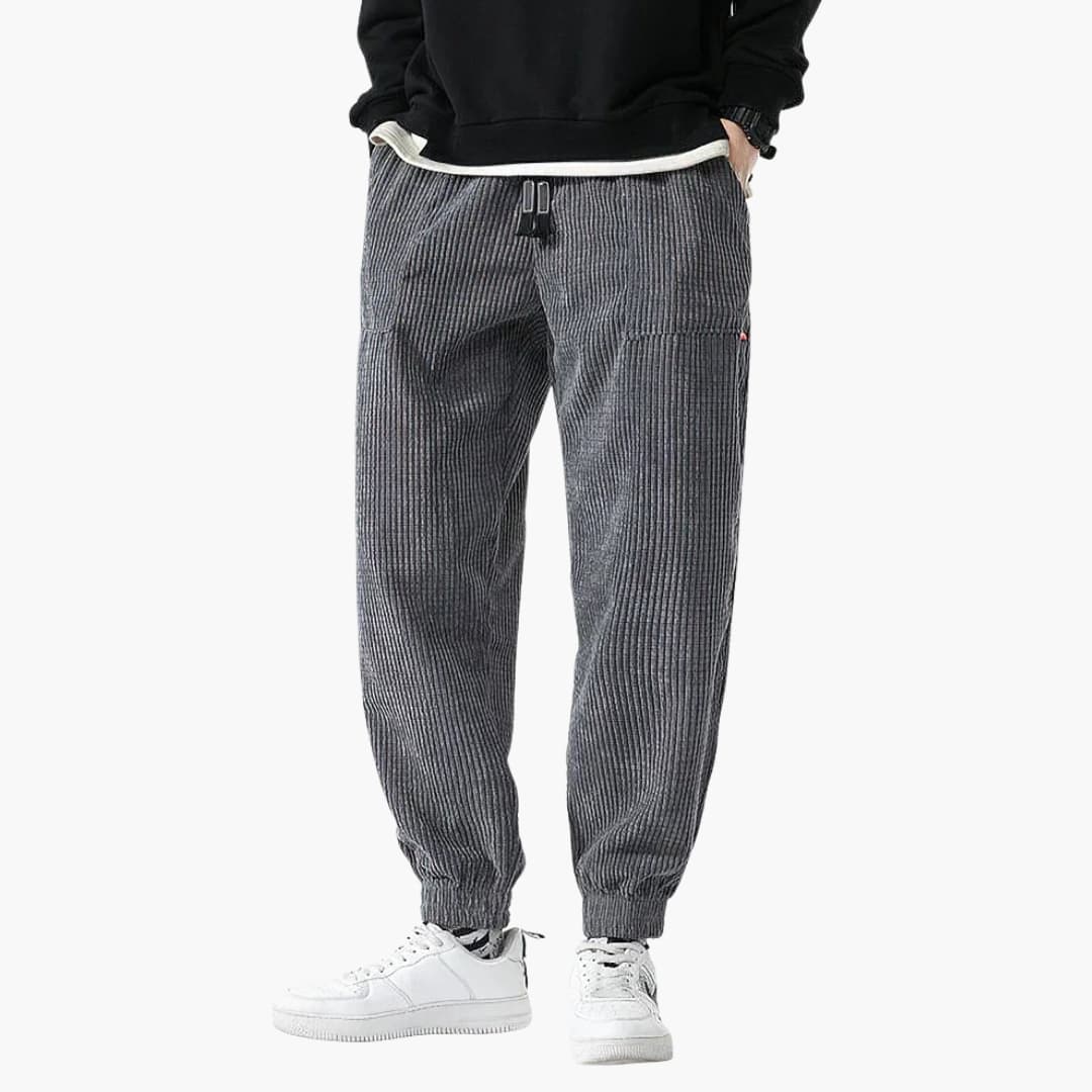 Men's corduroy joggers with drawstring and cuffs in gray by Wilfred Smith