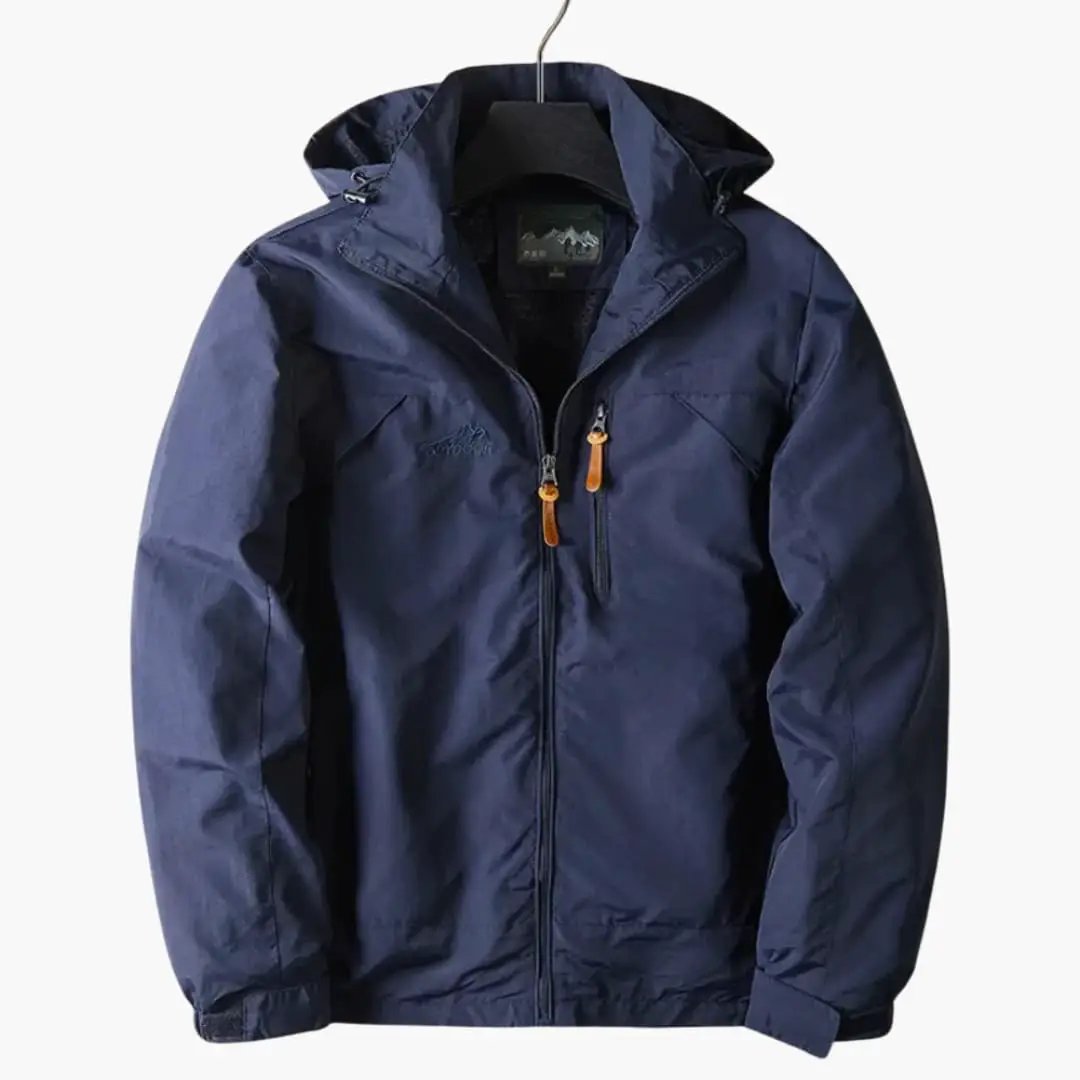 Men's Wilfred Smith navy sport jacket with hood, two chest zipper pockets, leather zipper pulls, chest logo