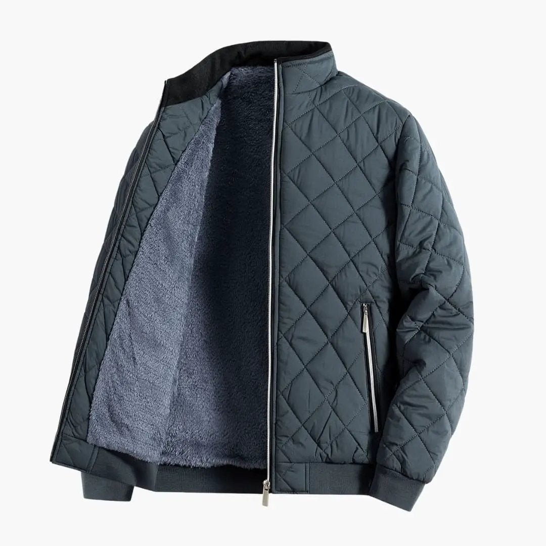 Men's quilted jacket by Wilfred Smith with stand-up collar and zip, navy-gray.